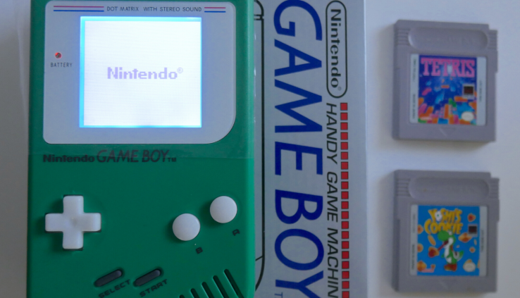 Green “Play it Loud” Nintendo GameBoy DMG-01 w Backlight Bivert Mod and a pair of Video games