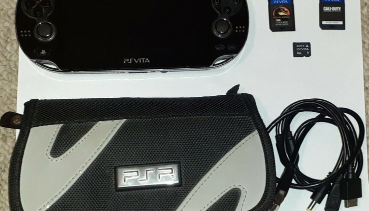 Sony PS Vita Console with Case, charging cable, 4GB reminiscence card, and two games. 