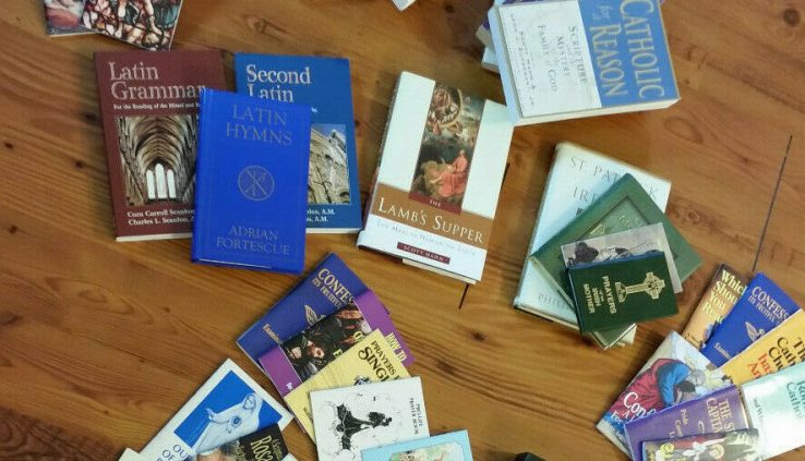 A number of a variety of Catholic books: Angels, Saints, Prayer, Latin and other topics