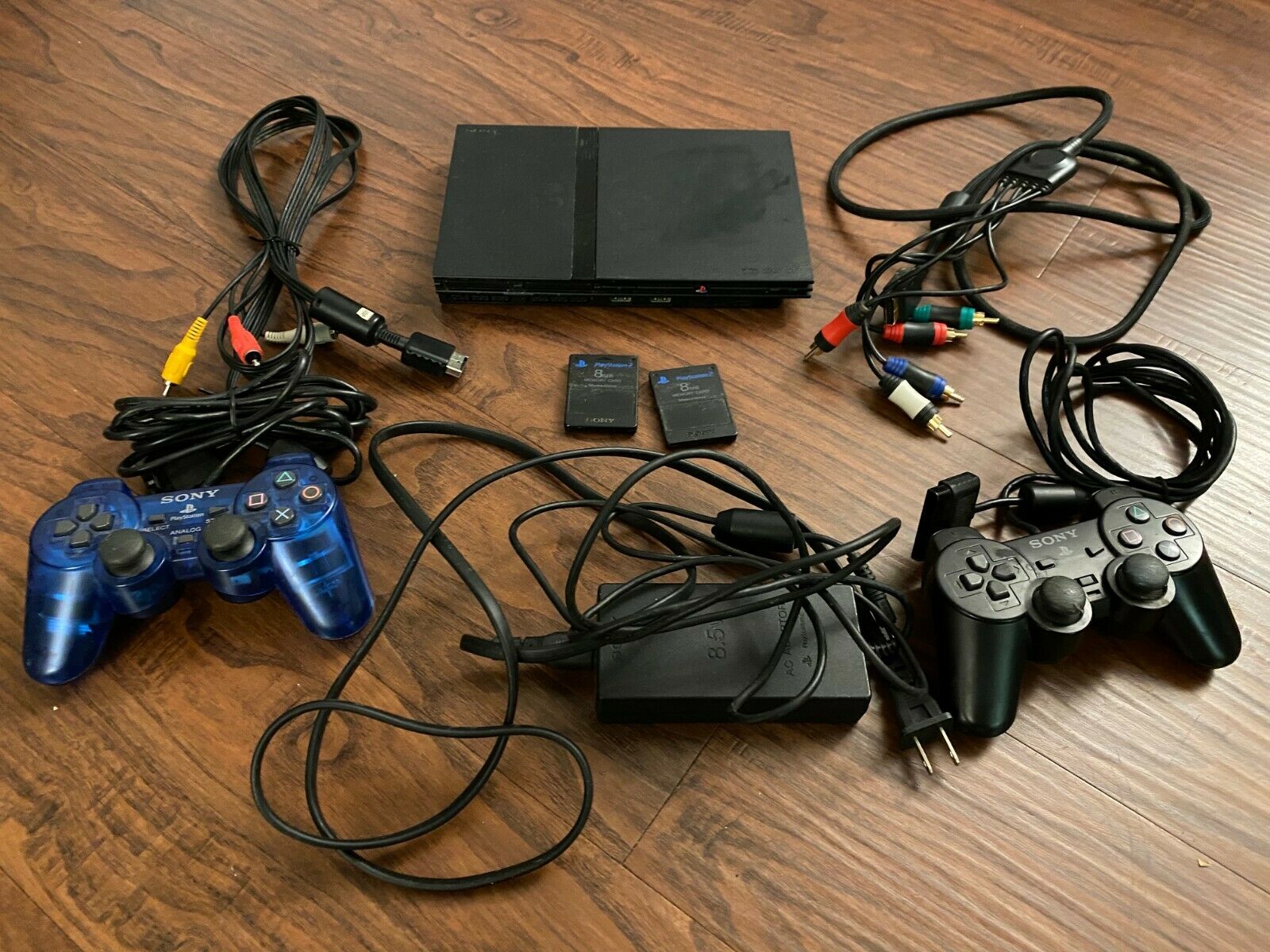 PS2 Slim Model Console with all cables, 2 controllers, 2 reminiscence