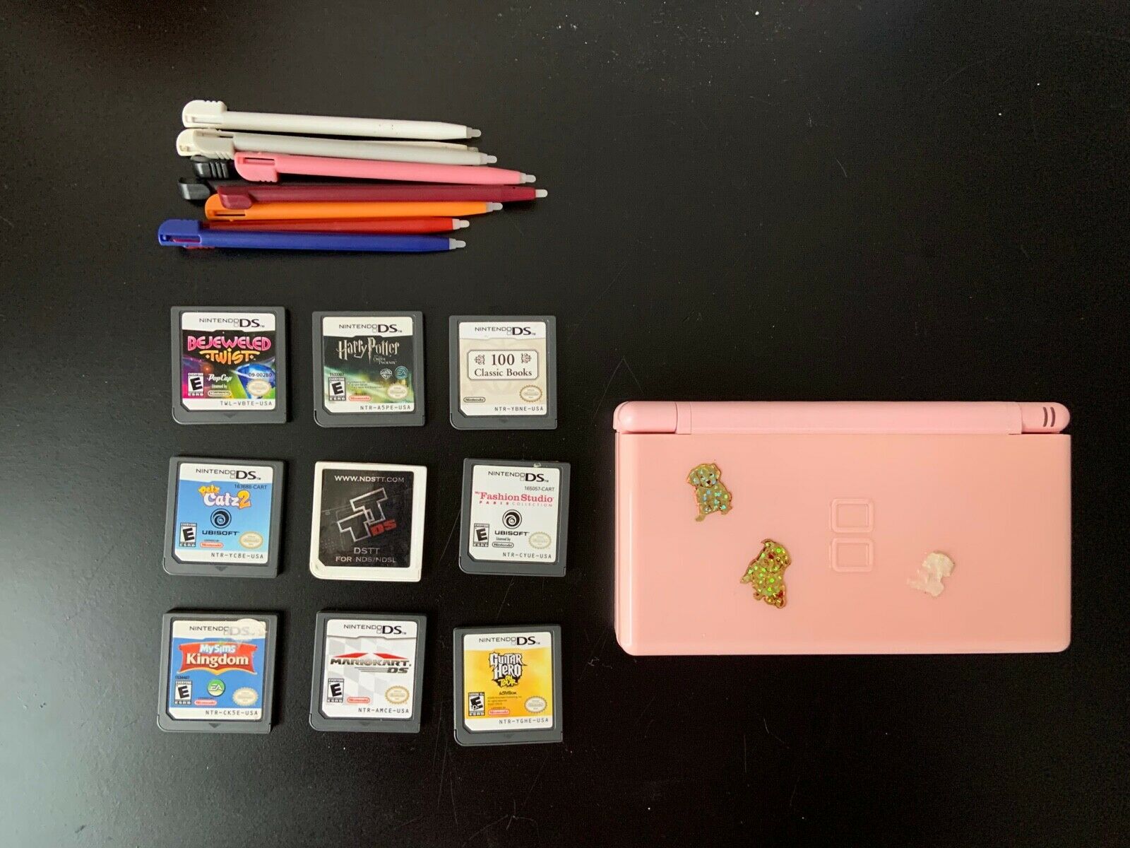 Nintendo DS bundle with pens and games on 
