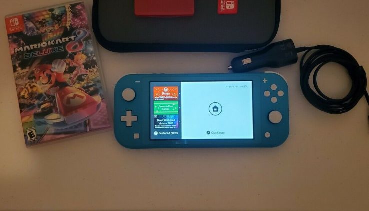 Nintendo swap lite turquoise with extras