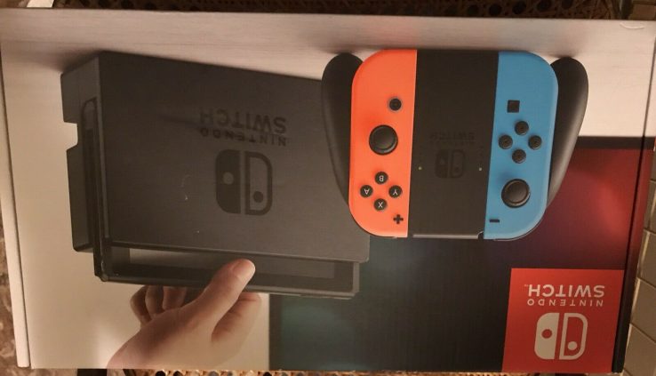 Nintendo Swap Neon Red and Neon Blue Joy-Con Console A tiny Feeble