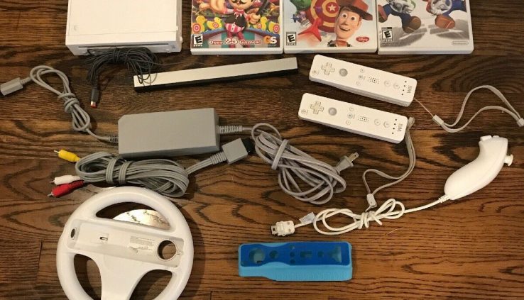 Nintendo Wii Console  with Mario Kart and Wheel, Controller, Nunchuck!! Video games