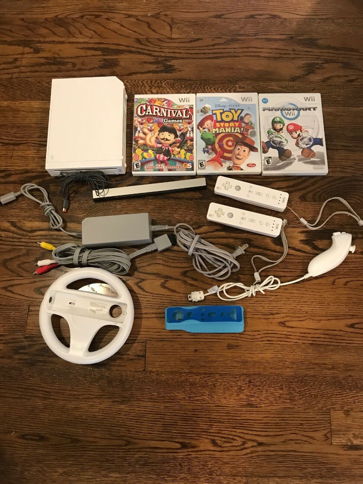 Nintendo Wii Console with Mario Kart and Wheel, Controller, Nunchuck