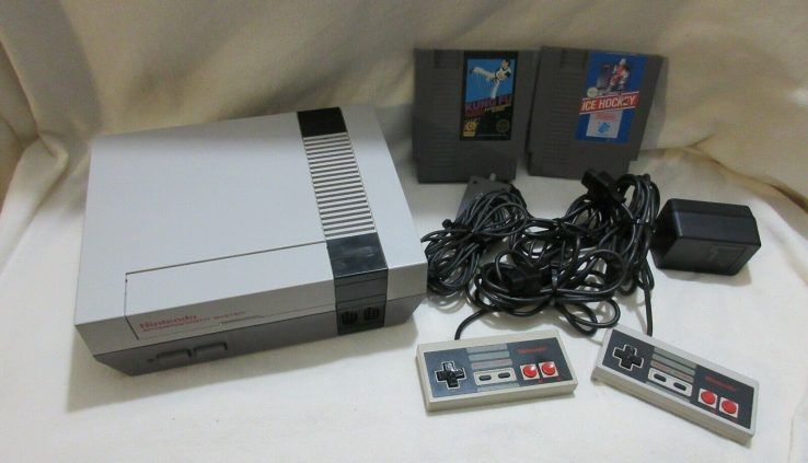 Normal nintendo entertainment system nes system w/instruments and video games works