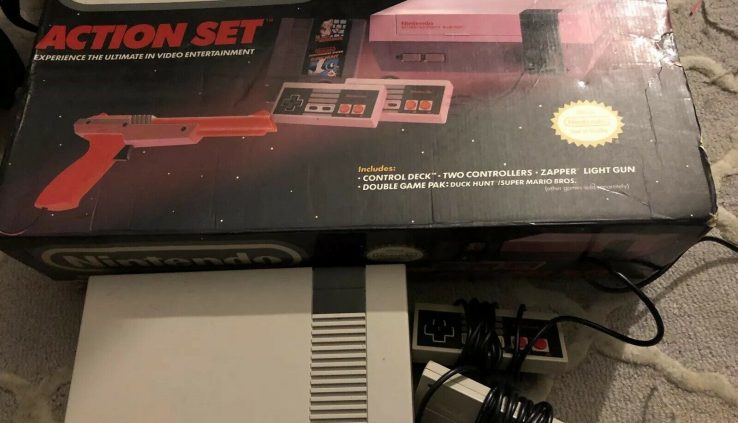 Nes New Console In Field With Controllers