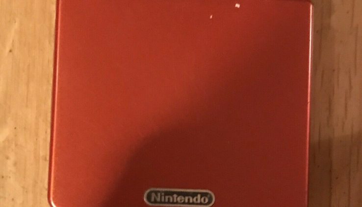 Crimson Nintendo Gameboy Near SP Map With 6 Games Pokémon Emerald