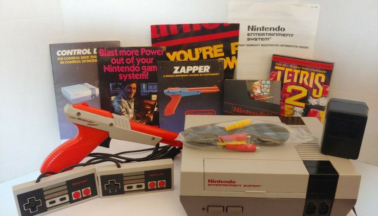Fashioned 1985 Nintendo Gaming Console NES – 001 – 2 Remotes, Orange Gun, 2 Games