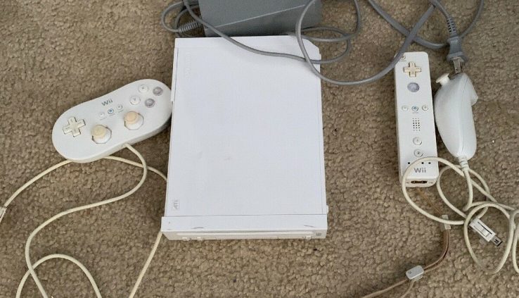 Nintendo  Wii Console – White Comes With Controllers Lacking The Motion Bar