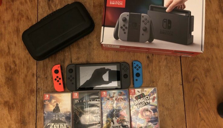 Nintendo Switch 32GB Console Bundle W/4 Video games(BOTW,Mario Birthday party, Diablo 3, SSB)