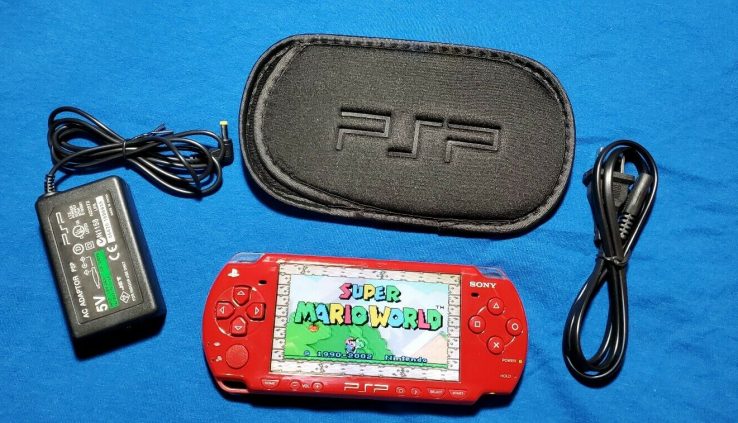 Sony psp 2000 / 2001 Crimson with 100 video games***64gb*** 10 movies***has points***