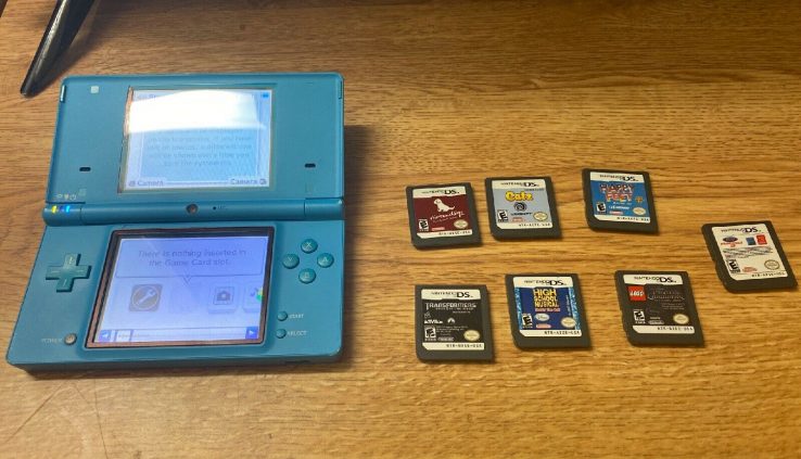 Nintendo DSi Teal Handheld with 7 Video games Tested Works Mountainous!