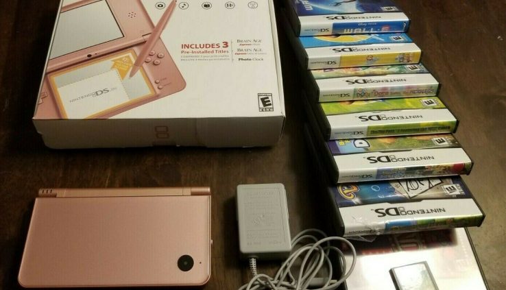 Nintendo DSi XL – Purple With 8 Video games, Stylus, Charger, Manual And Normal Field