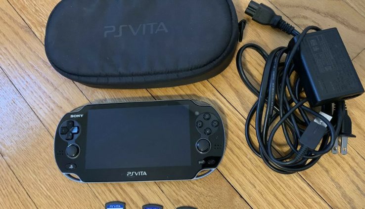 Sony PlayStation Vita 3.67 With Case & 3 Video games