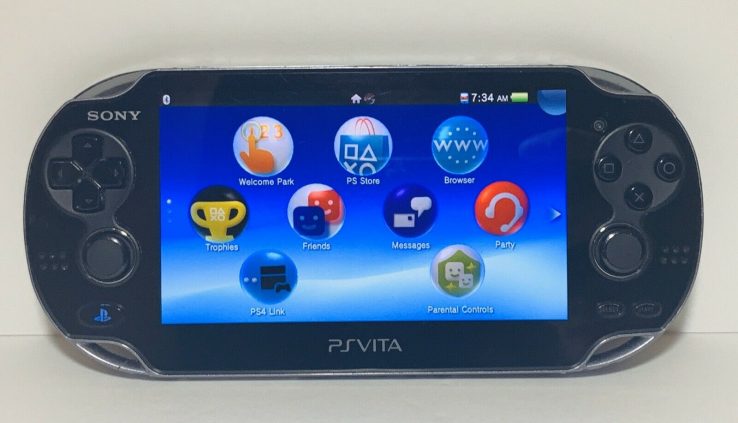 Sony PS Vita PCH-1001 OLED Bundle w/ Pickle off Grip, 3 Video games, 2 Memory Cards READ