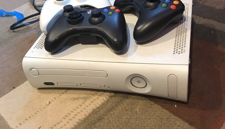 xbox 360 with 5 games, 3 controllers, And All Cords