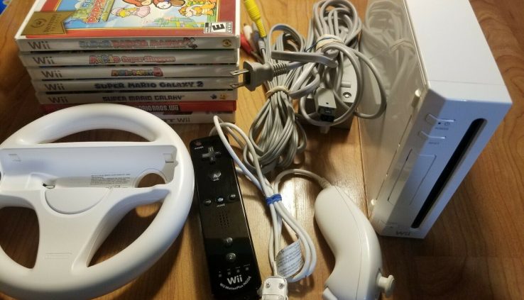 Nintendo Wii Console With mario Games included* Cleaned and Examined*