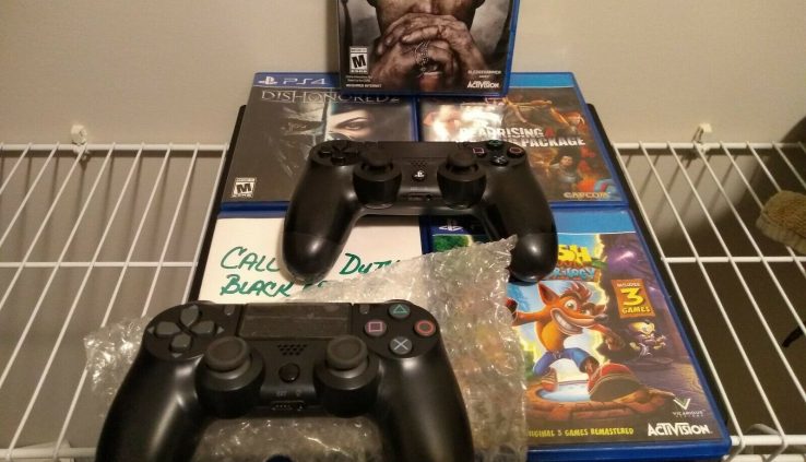 PS4 Pro 1TB With 5 games and two controllers one unique.