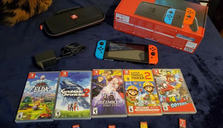 Nintendo Switch w/ Neon Crimson and Neon Blue Pleasure-Cons and 5 video games and case!