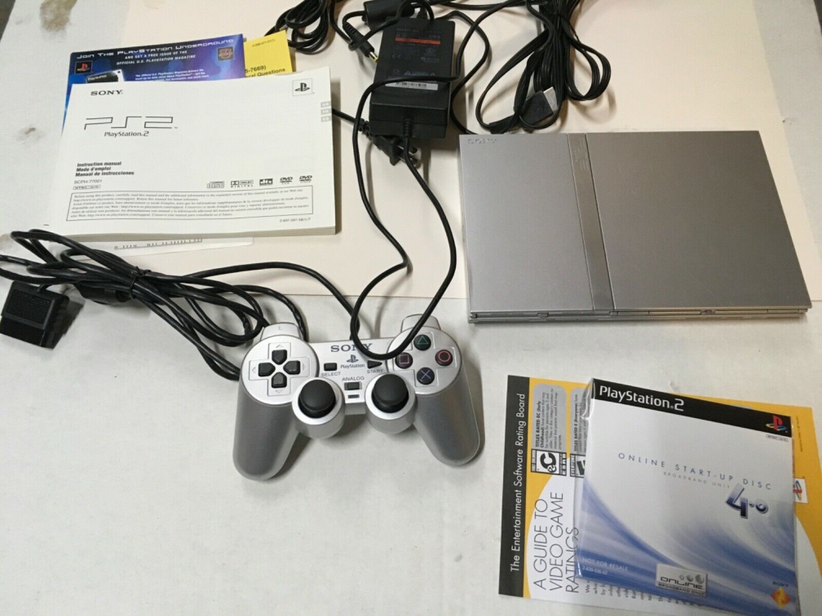 Entire Silver Sony PS2 SLIM PlayStation 2 Console Stale Gaming Gadget BUNDLE! on 