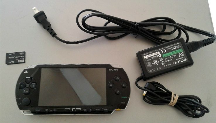 Sony PSP -1001 PlayStation Transportable With Charger and 2Gb reminiscence stick