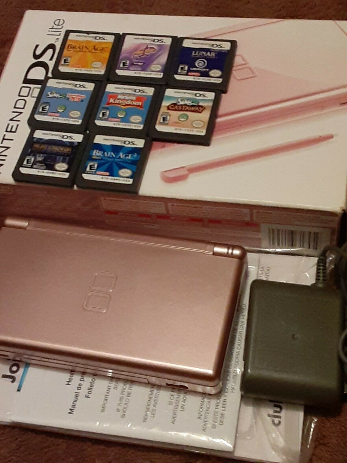 Purple Nintendo DS Lite - Starting up Field - with Video games ...