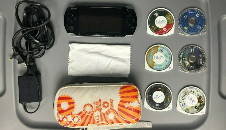 PSP 3001 Slim with Case, video games and charger. Barely aged.