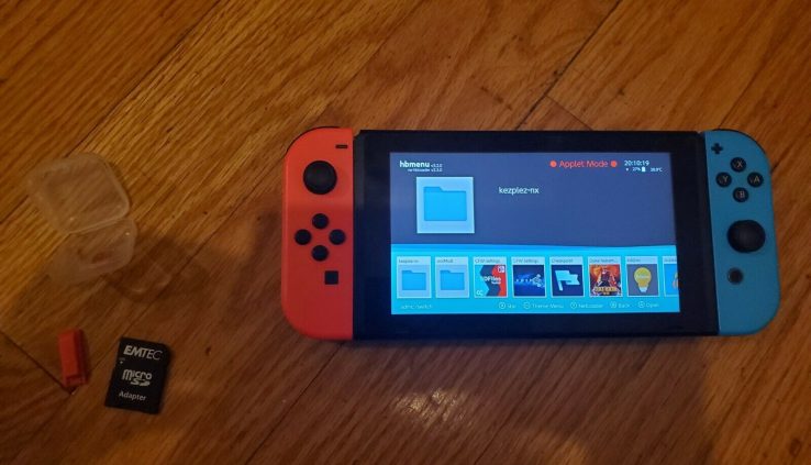 Nintendo Switch Bundle with Neon Red and Blue Joy-cons. HACKABLE SEE DESCRIPTION