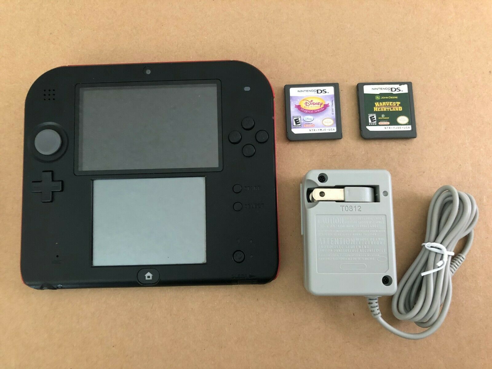 Nintendo 2DS Red with stylus two games and charger. Gargantuan working