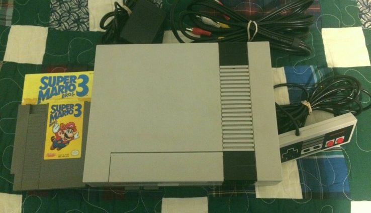 NES Console in vast condition with Extensive Mario Bros 3