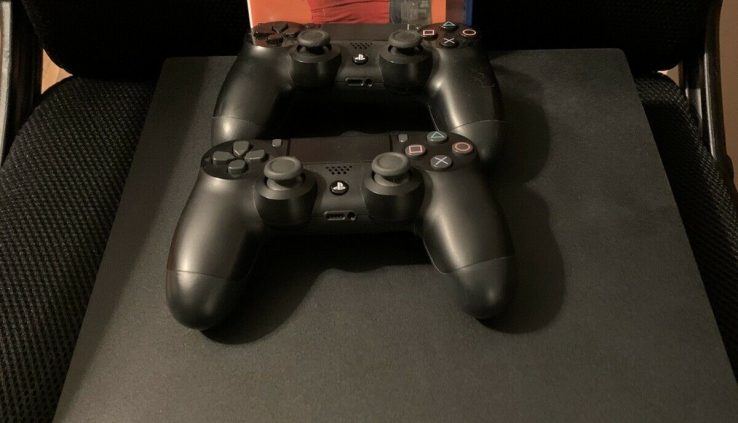 Sony PlayStation 4 Professional With 2 Controllers And Madden 20 and Controller Charger