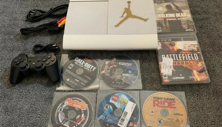 Ps3 Stout slim White Edition 500GB PS3 W/ 7 Games Bundle