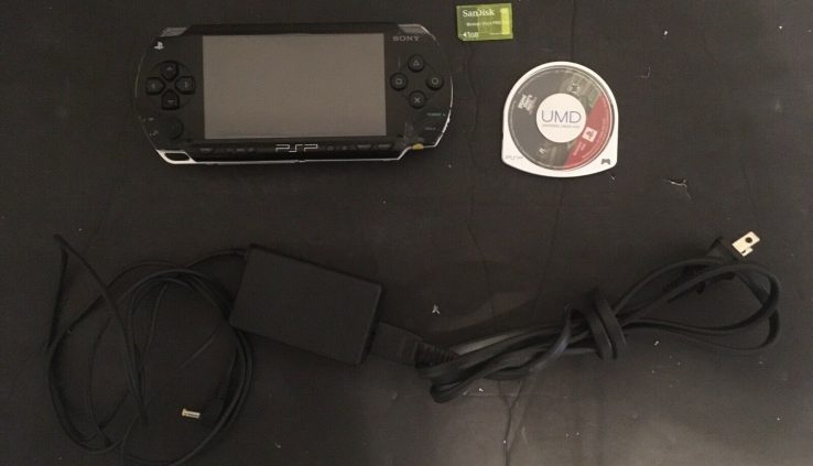 Sony PSP With Charger, 1GB Memory Card And Sport