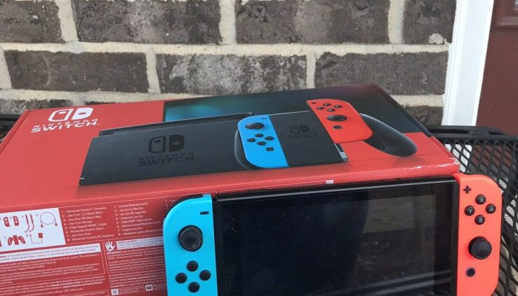 Nintendo Switch Console with Neon Blue & Crimson Joy-Con.