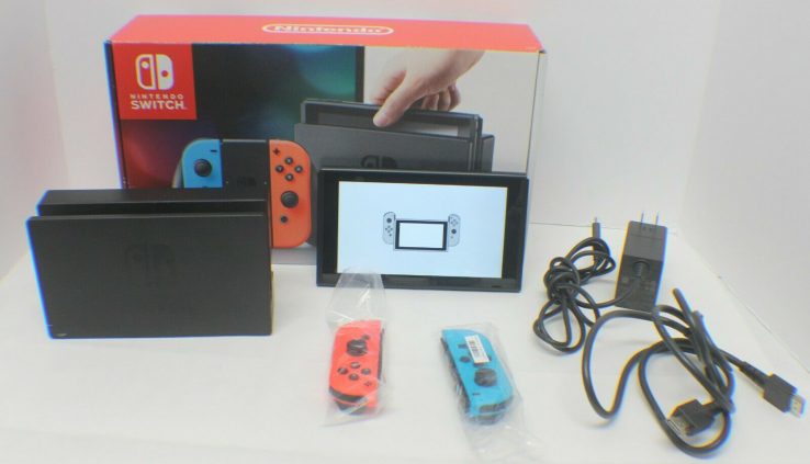 Nintendo Switch – 32GB Grey Console Crimson, Blue Joy-Cons in Field