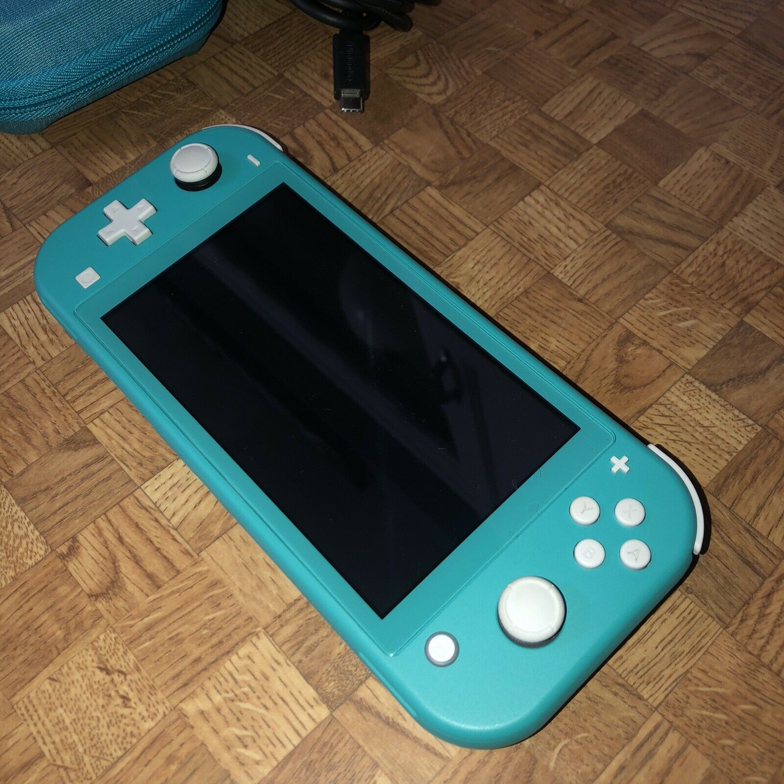 Nintendo SWITCH Lite Turquoise Teal Handheld Video Recreation Console w