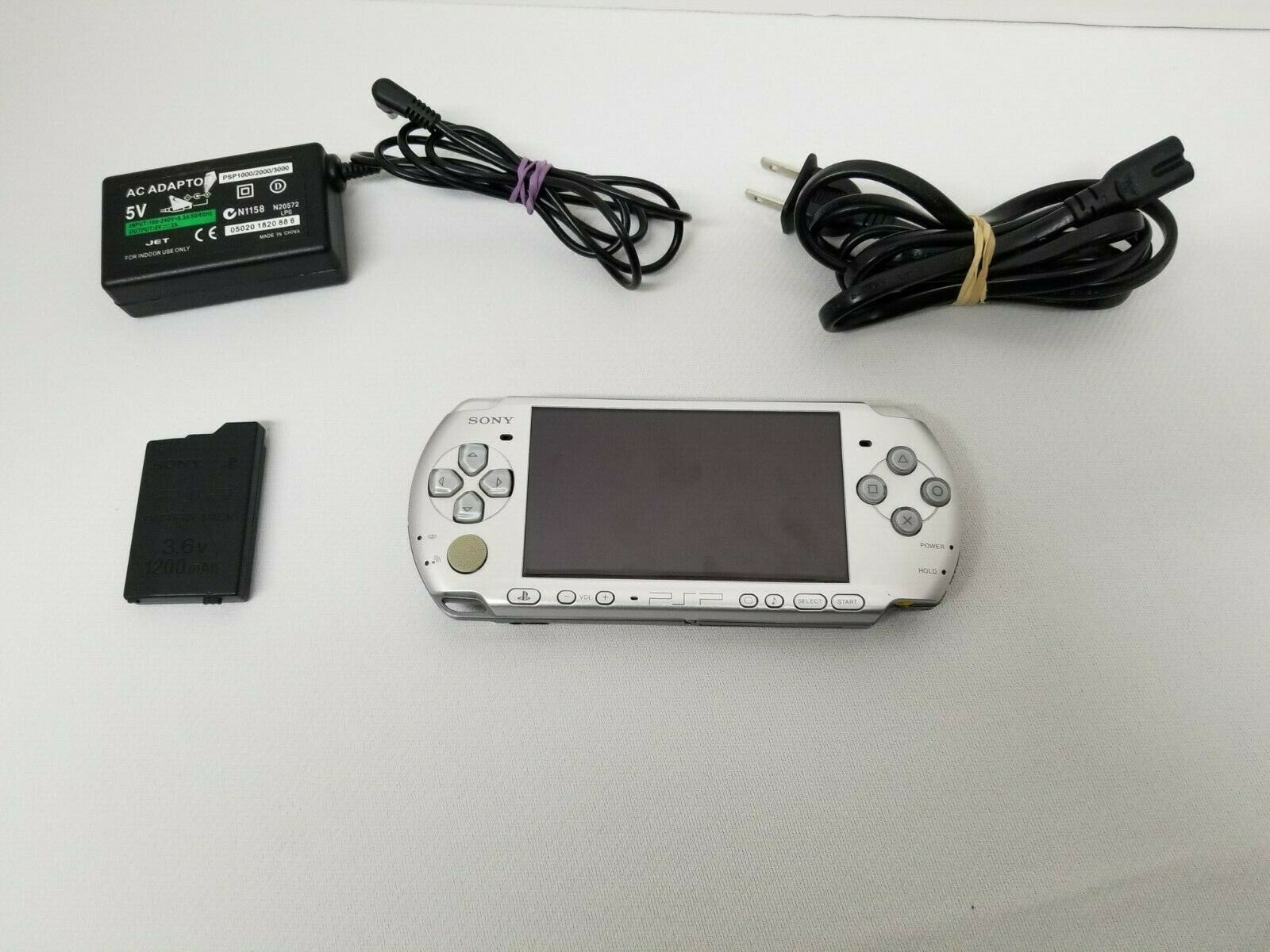 PSP 3001 Working Silver Sony PSP Lot with Charger, 2 Video games & 3