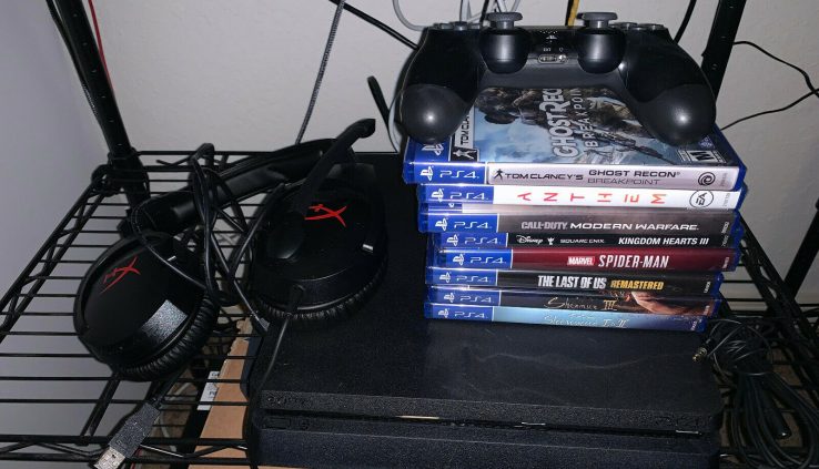 Sony PlayStation 4 1TB with 8 games and headset!