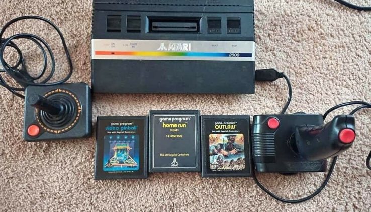 Atari 2600 Jr. W/ 2 joysticks and 3 video games