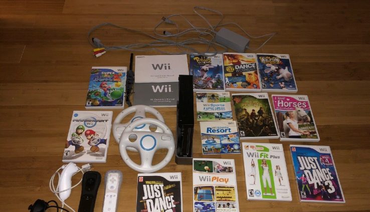 wii console (murky) with games