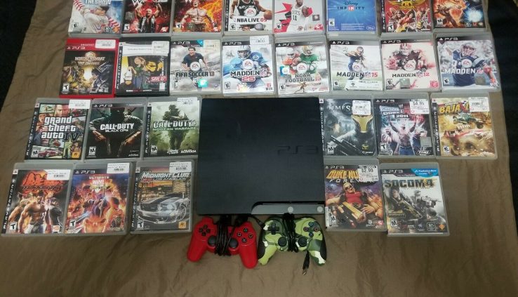 Sony playstation3 alongside with 2 controllers and 27 games