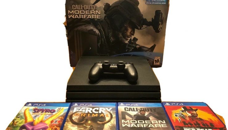PlayStation 4 Pro w/ 4 Games.
