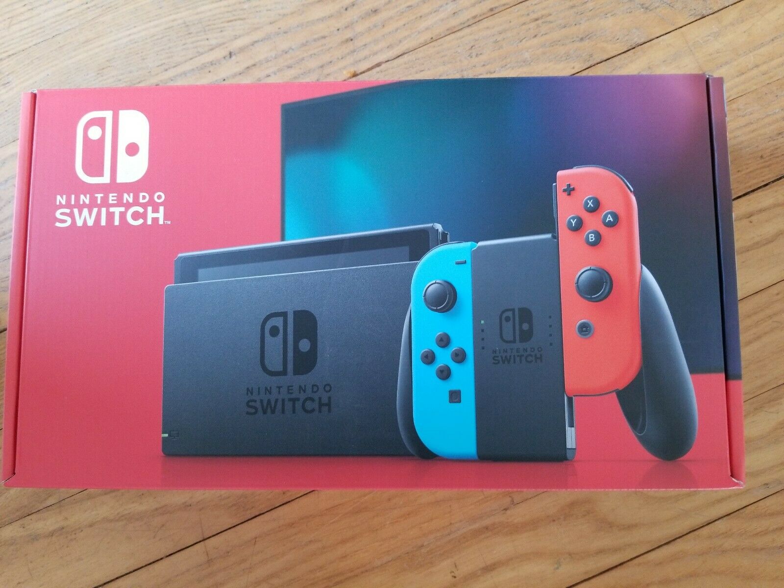 Nintendo Switch 32GB Console with Neon Blue & Neon Red Joy Con *NEW IN