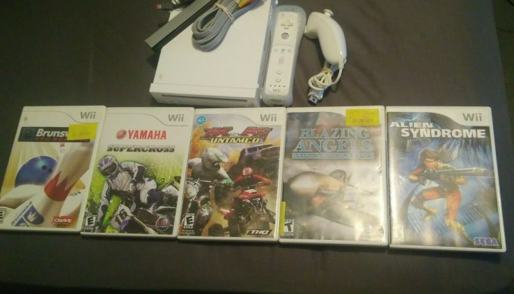 Wii system with video games Bundle. Discover Description And Pics.