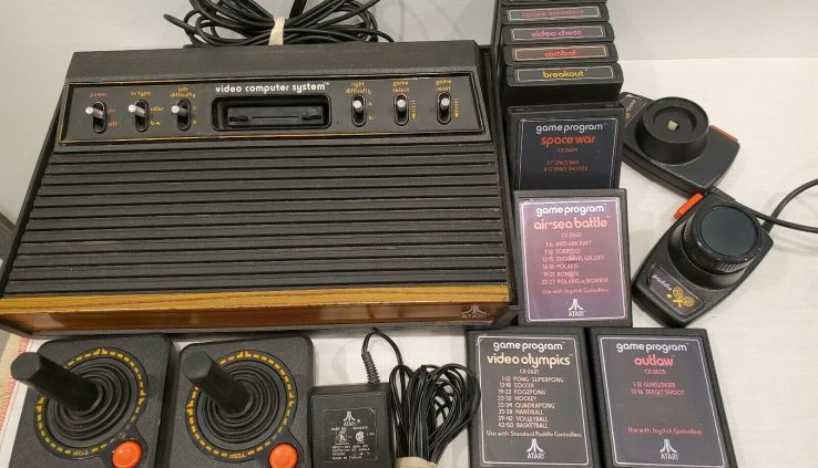 Atari Video System w/10 Games, Joy Sticks, Paddles, 1 Lacking Knob, No longer Tested