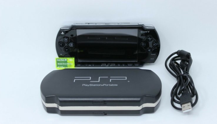 Sony PSP 2001  – 4 GAMES and 4 MOVIES- FREE SHIPPING