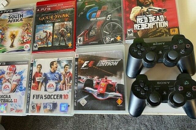 Sony PS3 Slim 120 GB Gaming Console + 2 Controllers + 7 Video games + Cords CECH-2001A