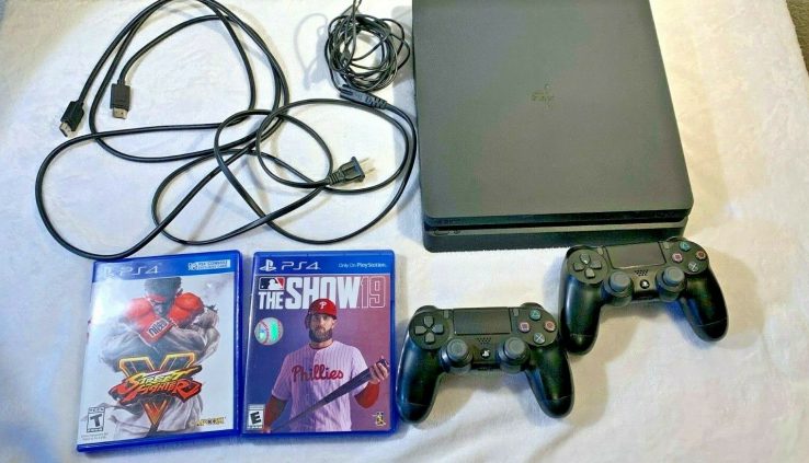 Sony PS4 Slim 1 TB Model CUH-2115B Bundle with 2 Controllers and a pair of Games