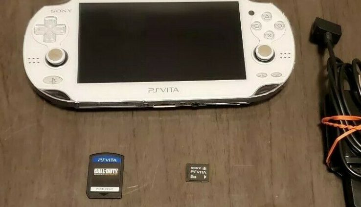 Ps vita glacier white – With Charger And Game